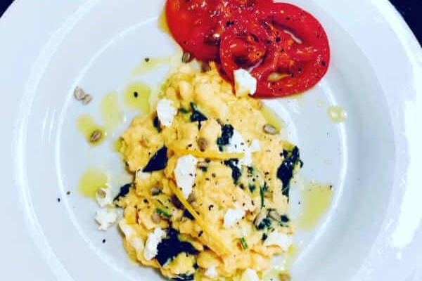 Scrambled Eggs with Basil, Feta & Spinach with a lemon basil olive oil dressing